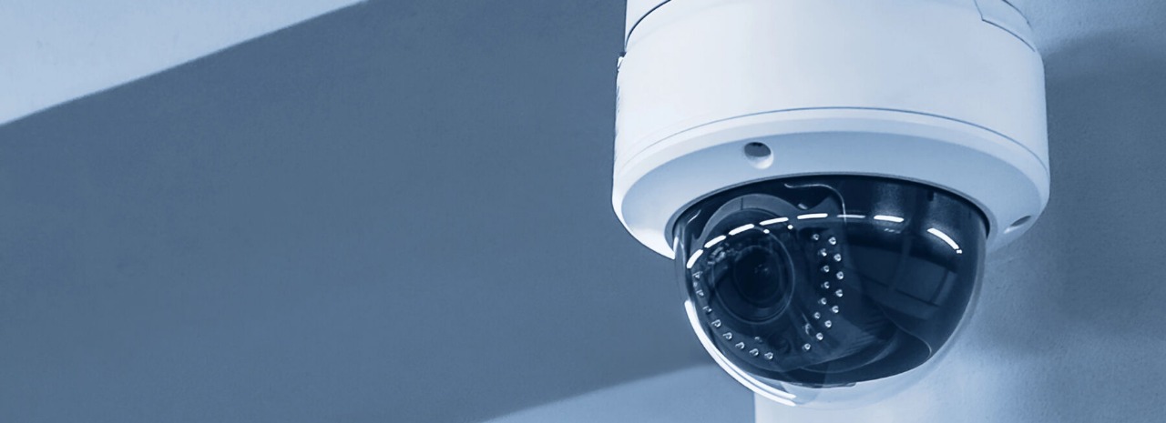 Security technician installing CCTV